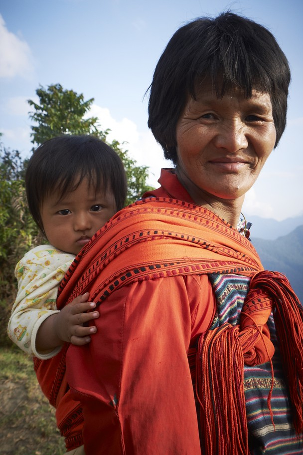 Bhutan:  Grandmother with her granddaughter.